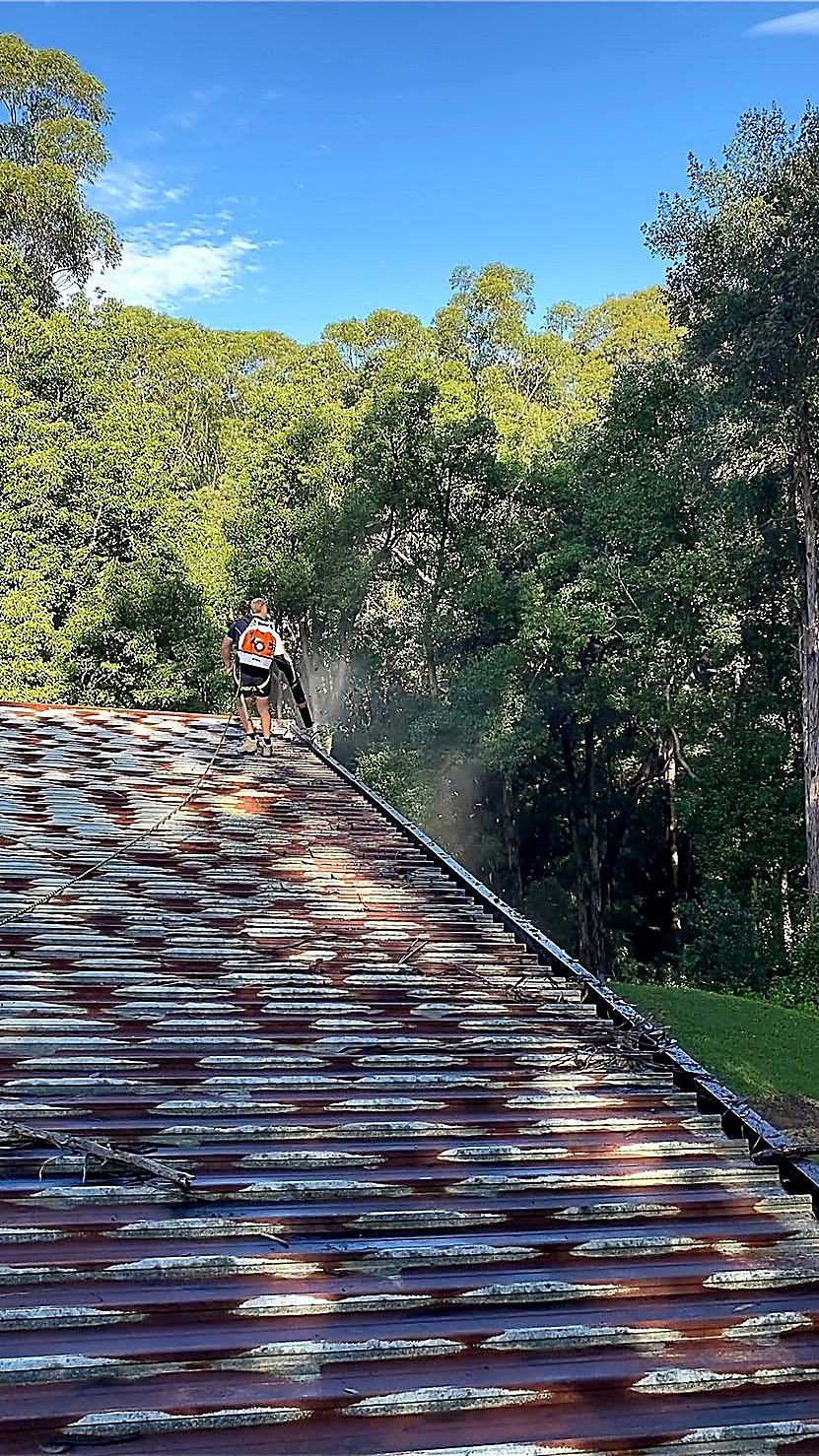 Commercial metal roof gutter cleaning